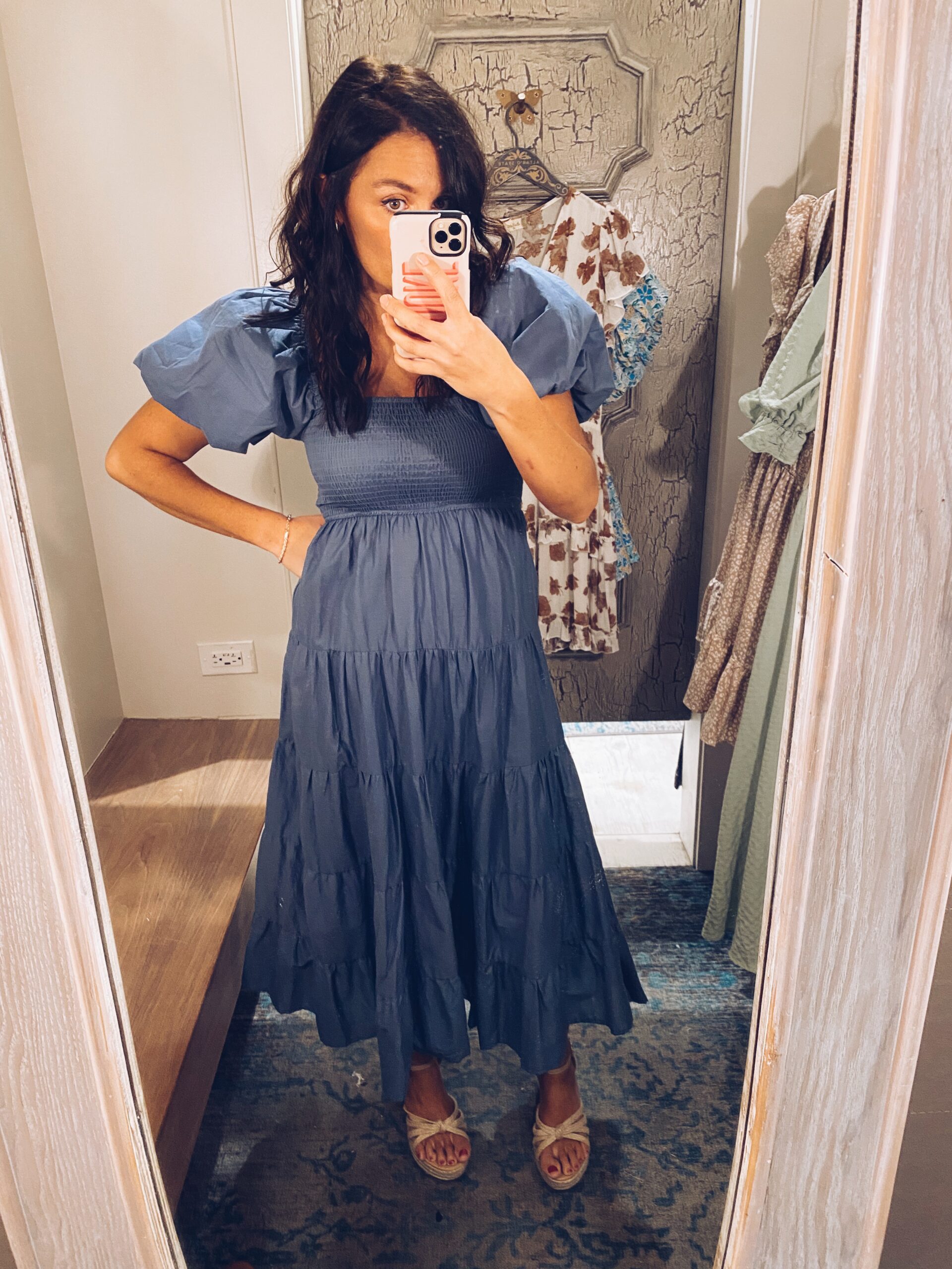 Woman wearing blue maxi dress as an example of cute teacher outfits