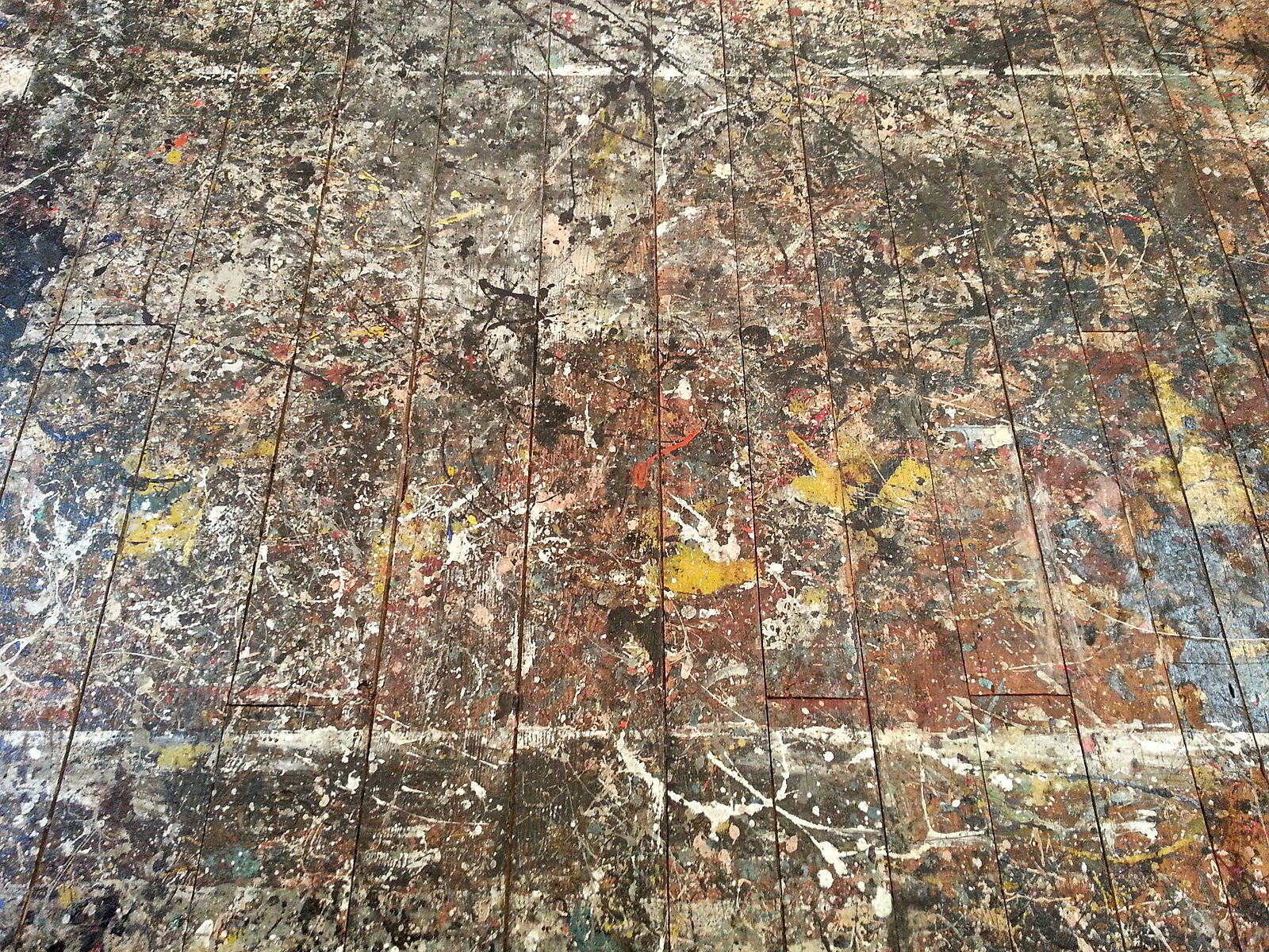 Jackson Pollock's studio floor covered in paint