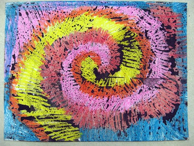 Spiral made of crayon scribbles and painted over with black watercolors