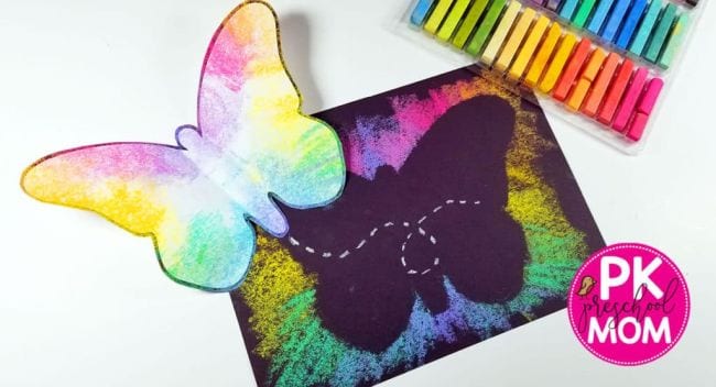 Butterfly art made with chalk pastels and black construction paper