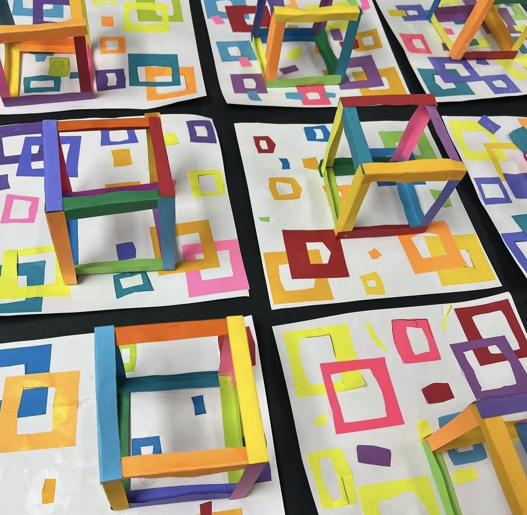 3D paper cubes on geometric backgrounds