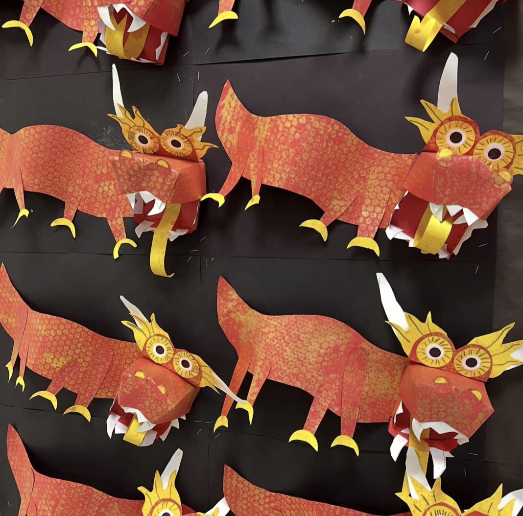 Paper Chinese dragons on a black background