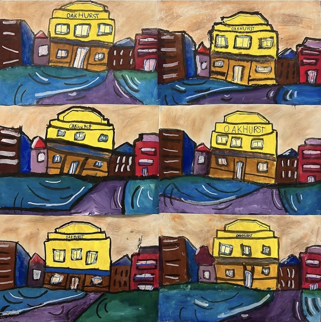 Paintings of an elementary school by first grade students