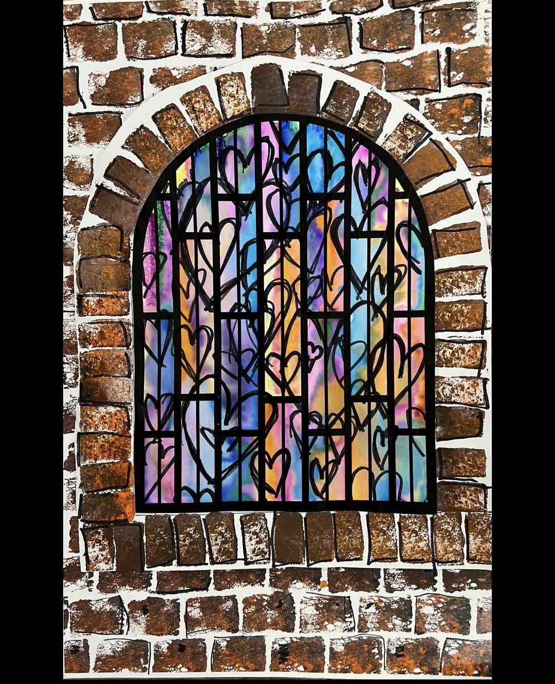 Stained glass window painting by 1st graders