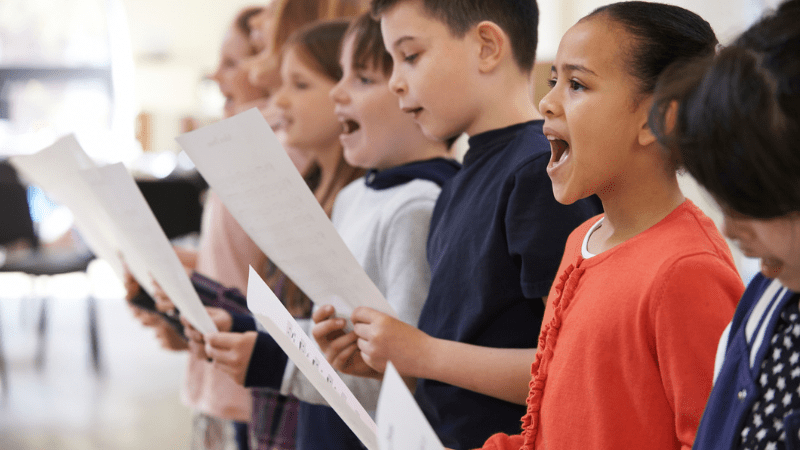 Young students singing in a choir