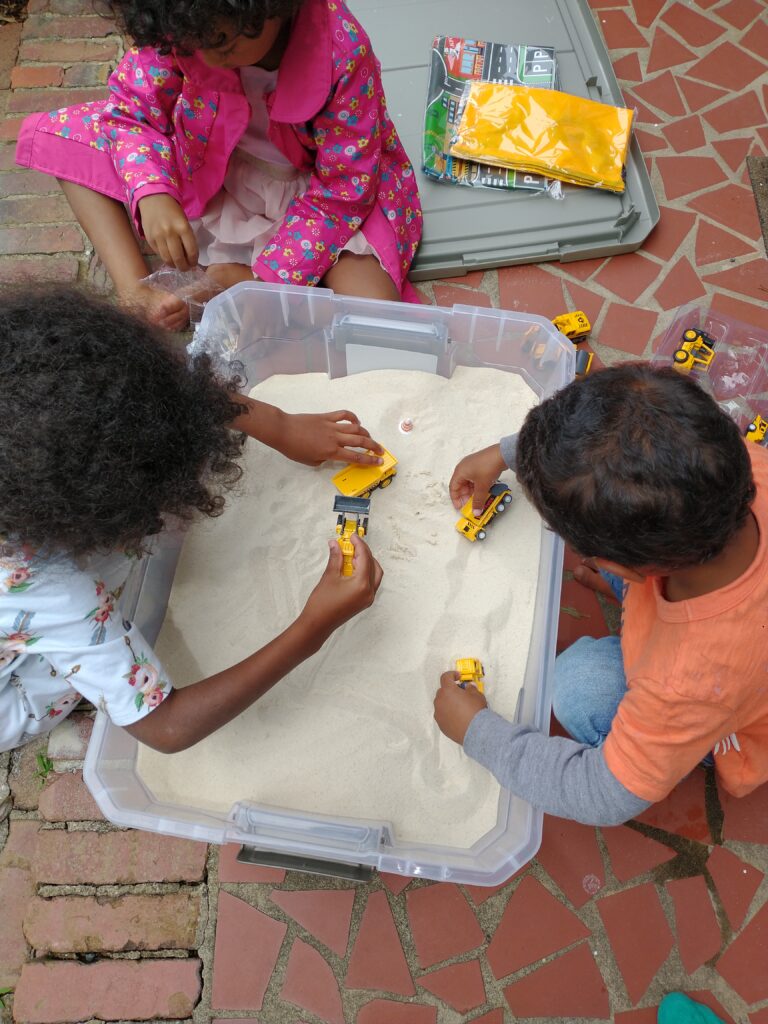 Kids playing in a sandbox