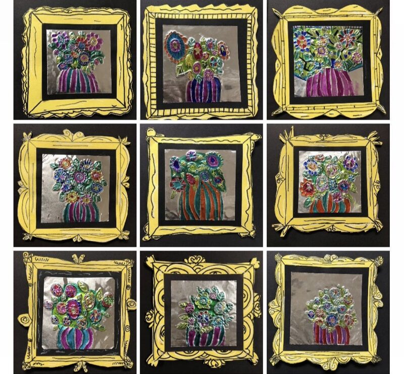 Foil embossed flowers with gold frames made by 2nd grade art students