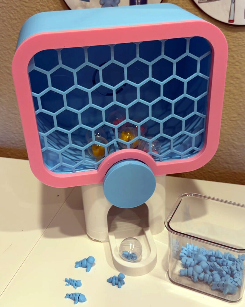 3D printed toy capsule vending machine in blue and pink