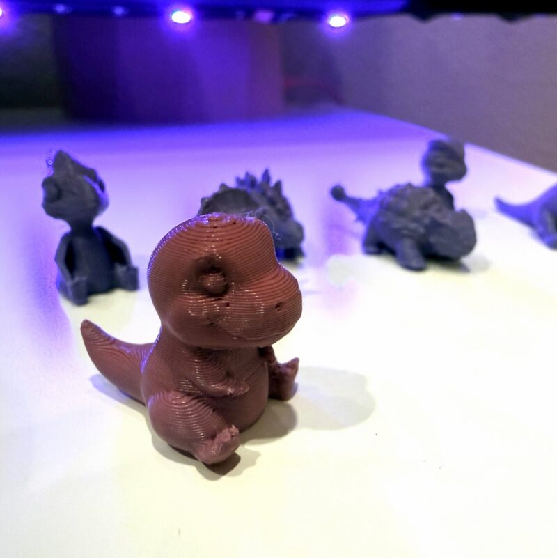 Small 3D printed dinosaur toys