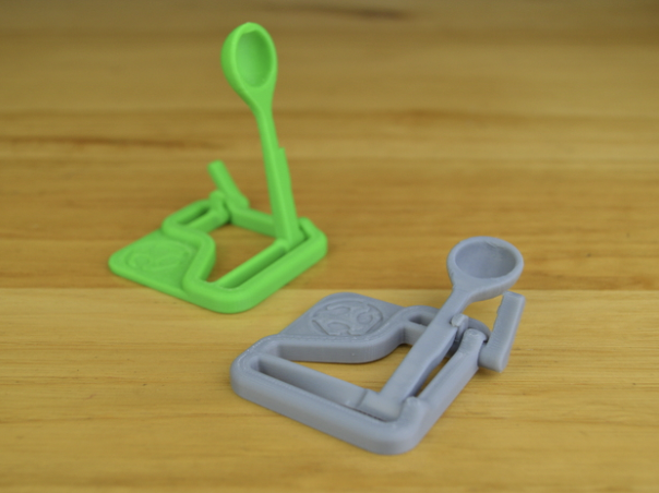 Small green and grey 3d printed catapult toys