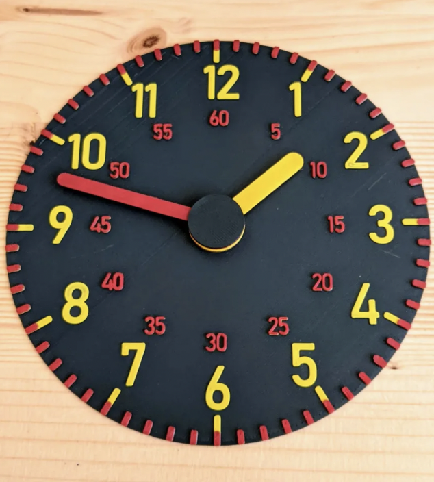 3d printed black clock with yellow letters- 3D printing ideas