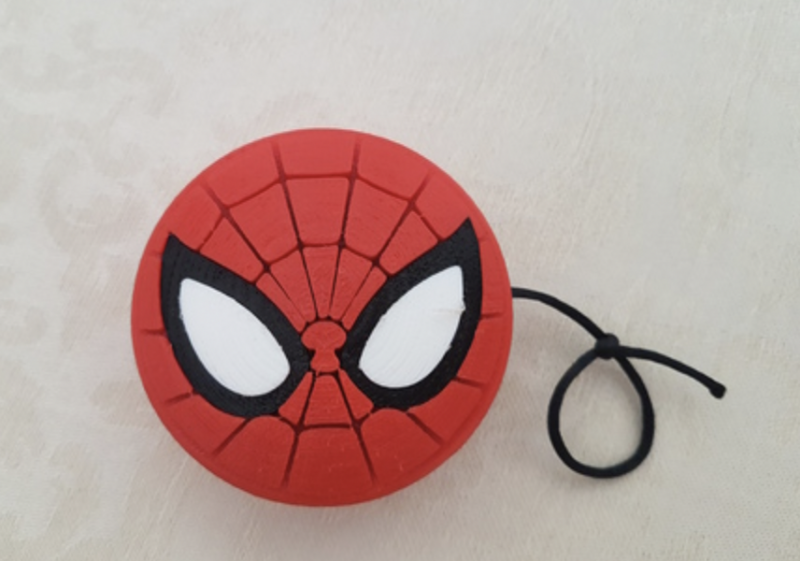 Red yoyo with Spiderman face