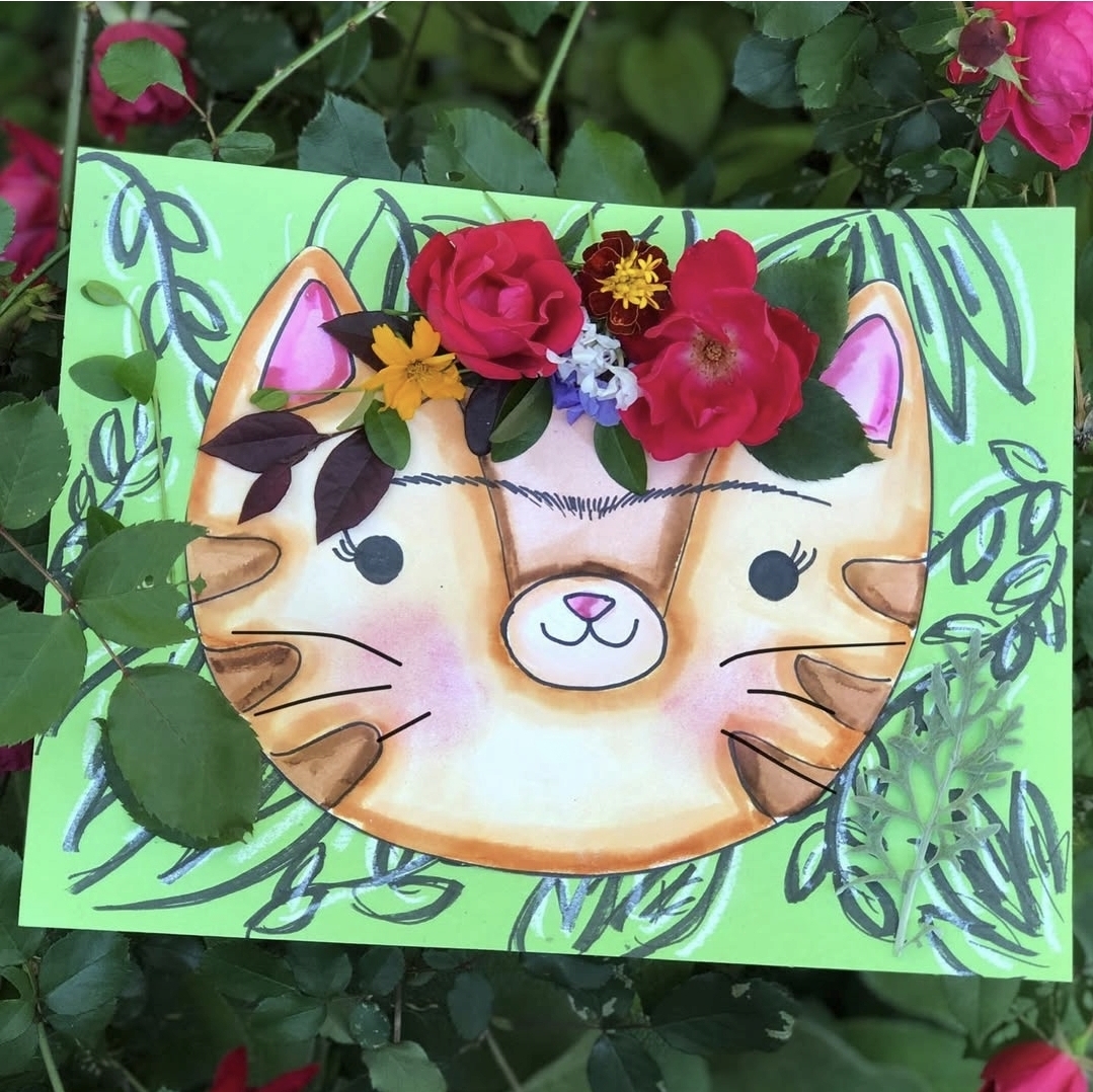 Mixed media cat head with artificial flower crown