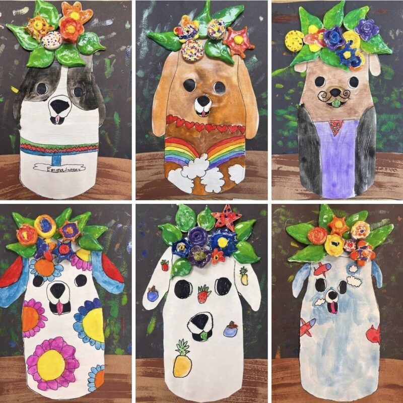 Mixed media dog vases with paper dogs and clay flowers
