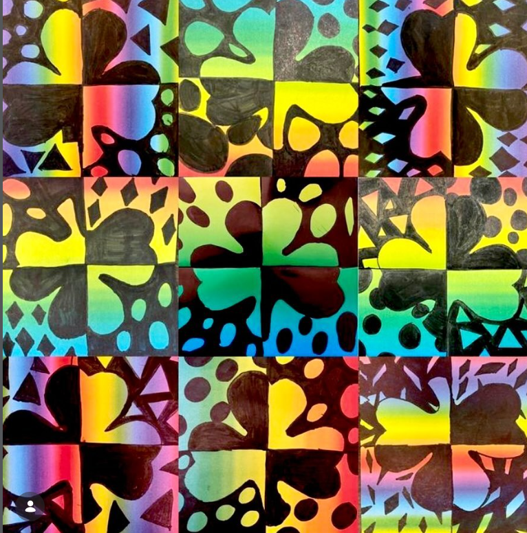 Geometric shamrock drawings using negative space and bright colors