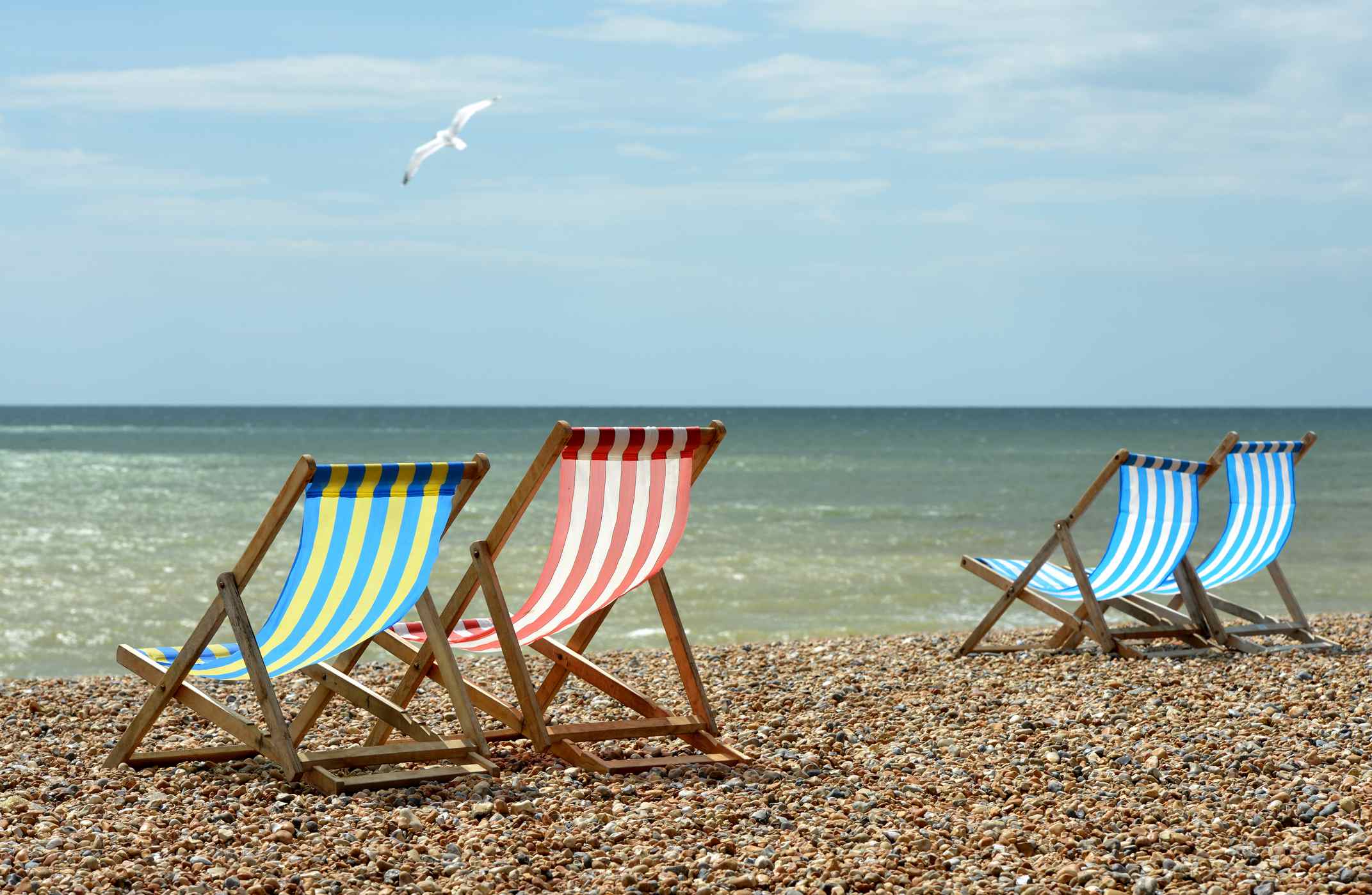 Deck chairs on an English Beach overlooking the English Channel