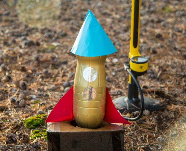 Rocket built from plastic bottle attached to a bike pump