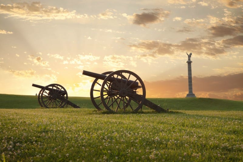A pair of cannons at sunset on the Antietam National Battlefield near Sharpsburg, Maryland