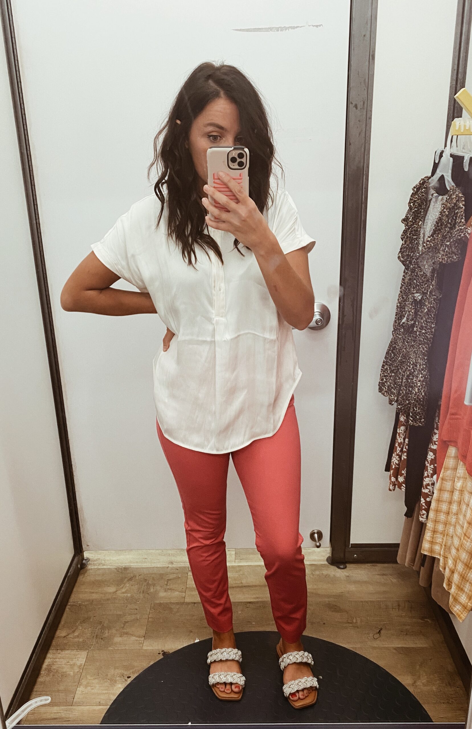Woman wearing pink pants and white top