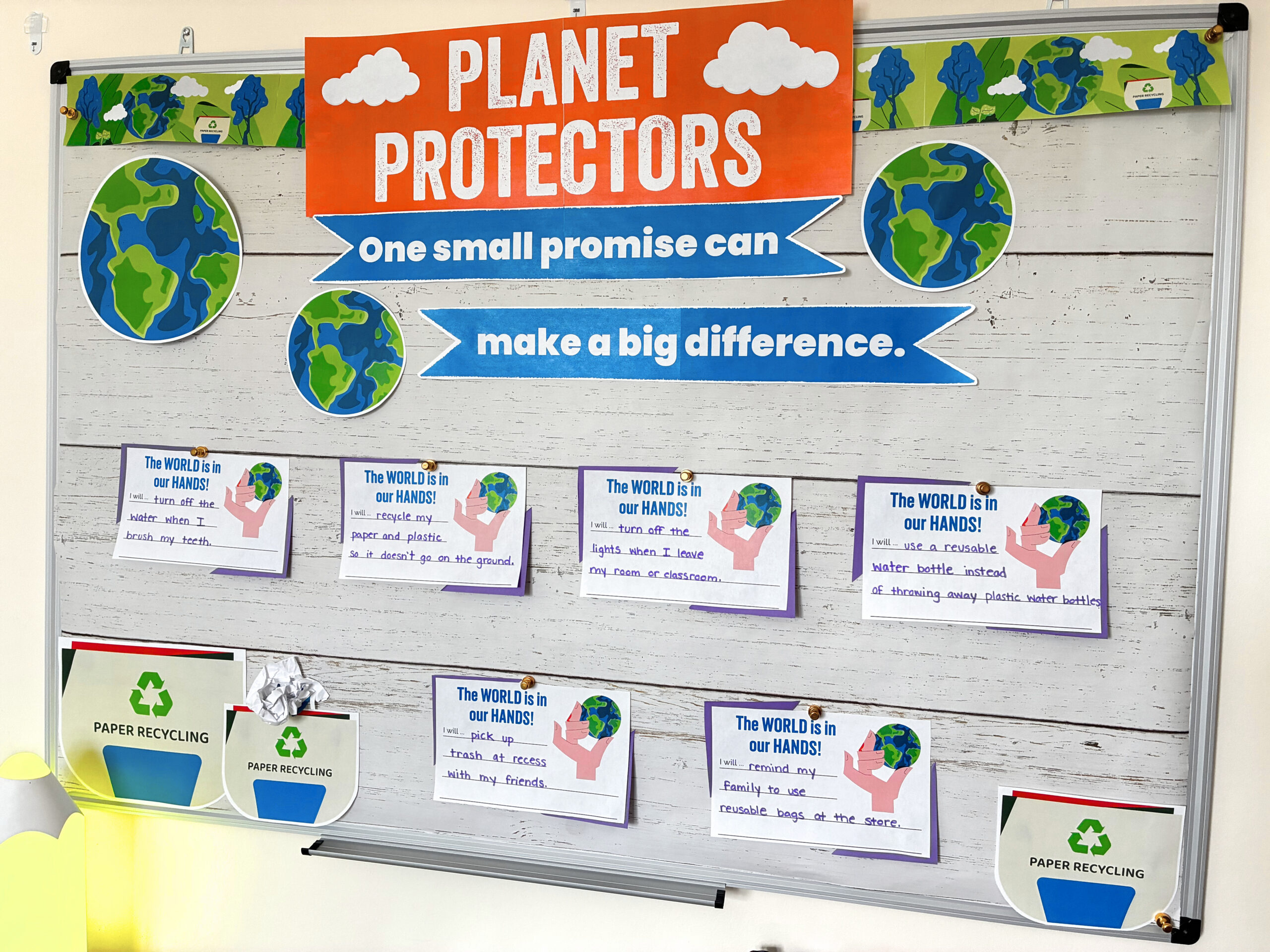 an image of a spring bulletin board kit: planet protectors