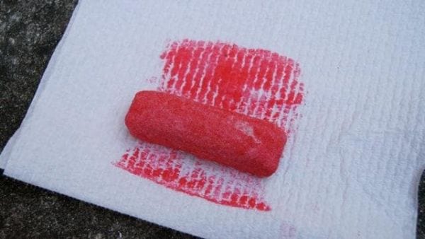 Chunk of pink chalk lying on paper towels (Easy Science Experiments)