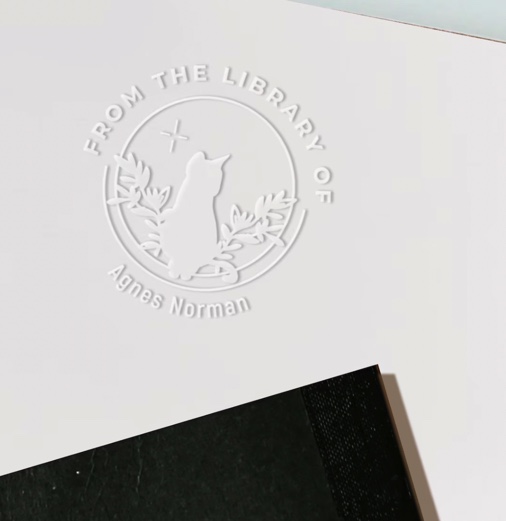 book embossed with cat logo 