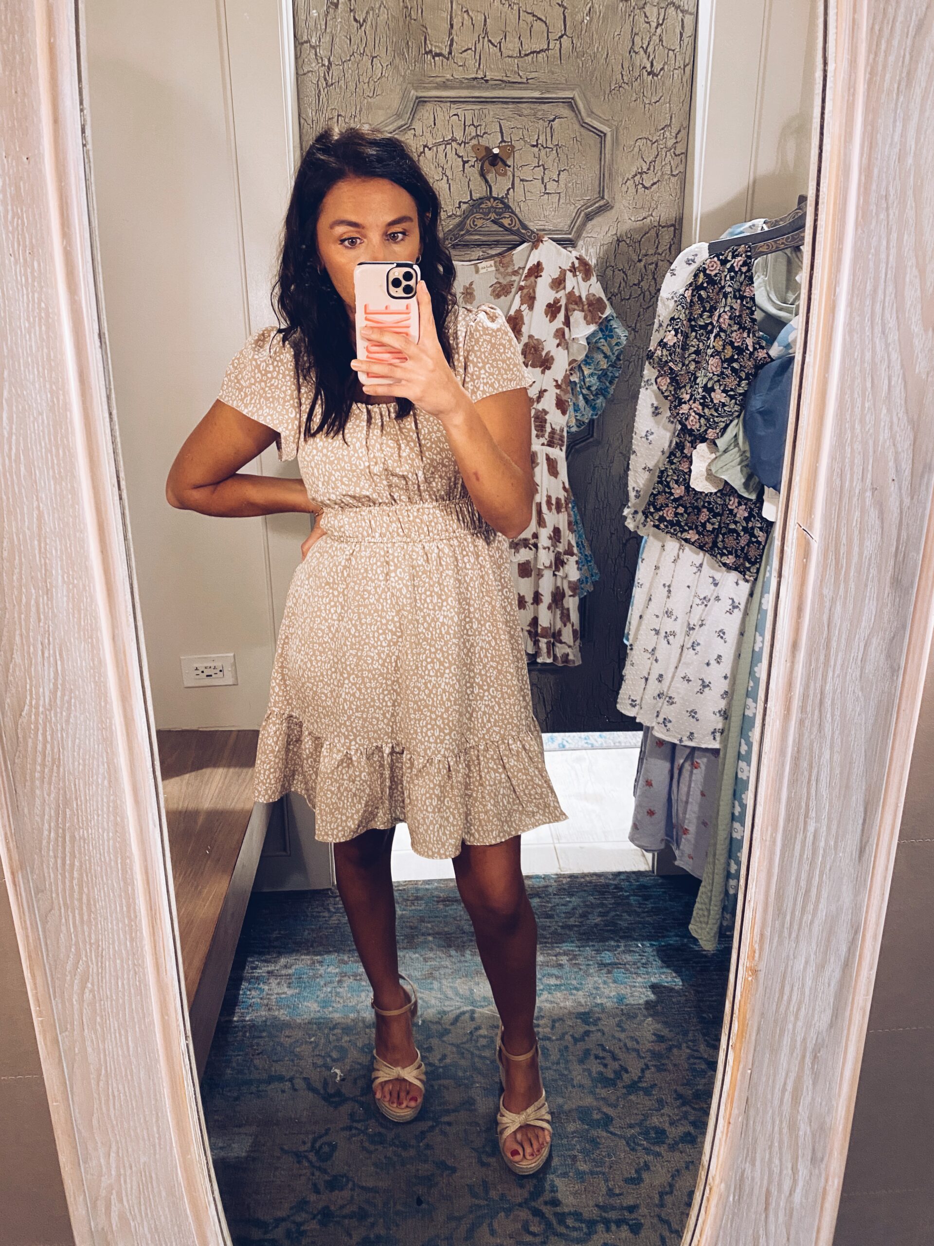 Woman wearing floral dress as an example of cute teacher outfits