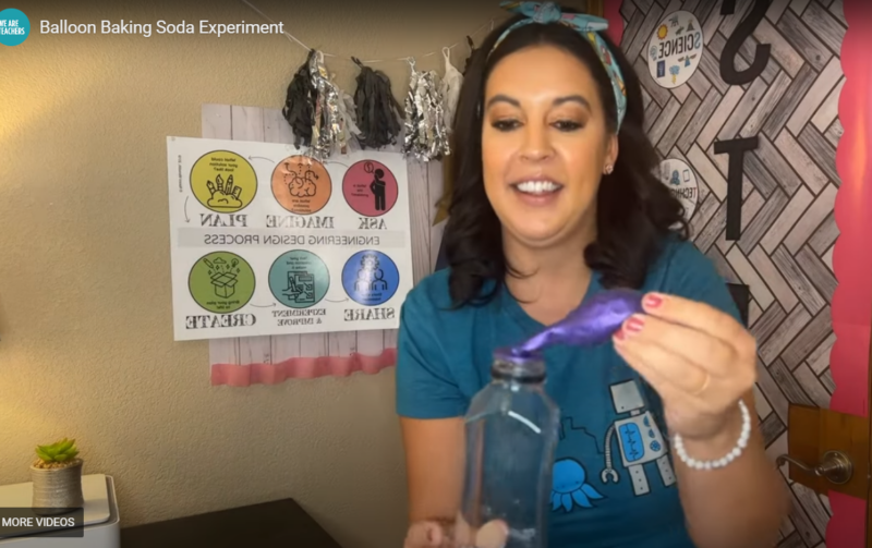 A woman is shown holding a purple balloon that is attached to a clear container.