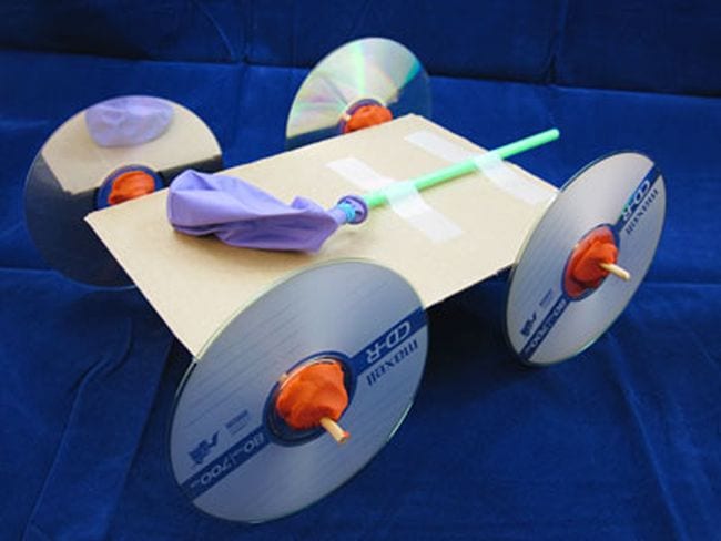 Car built from cardboard with CD wheels and a balloon motor (STEM Activities)