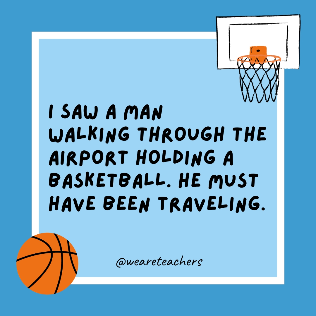 I saw a man walking through the airport holding a basketball. He must have been traveling.