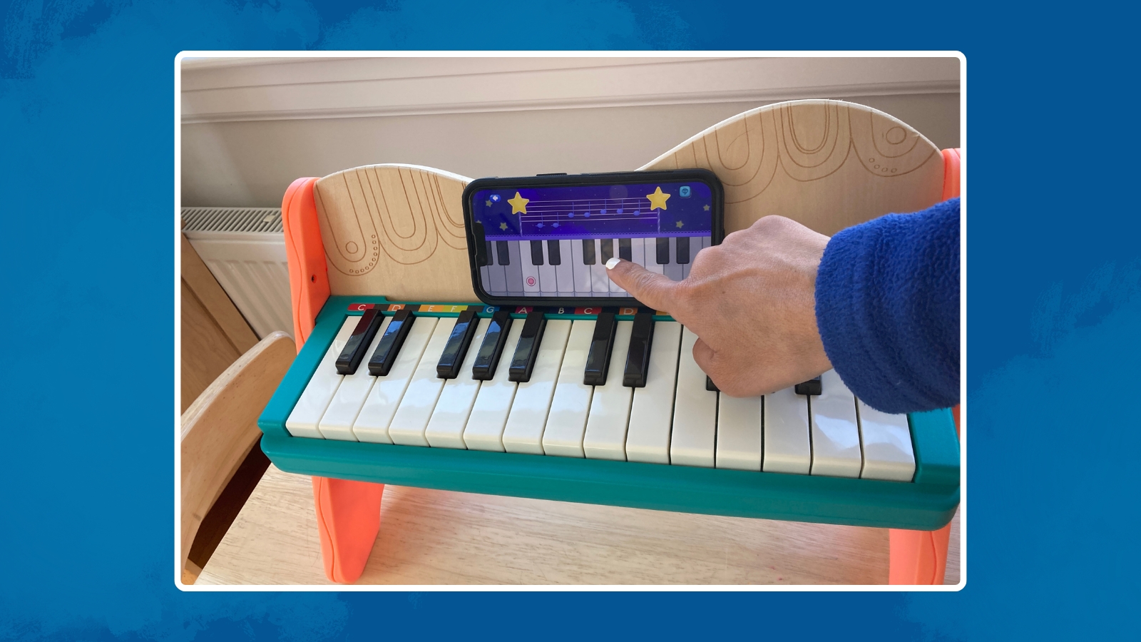 Image of the Bimi Boo Academy app showing a keyboard in a classroom setting