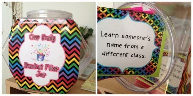 Large plastic jar labeled Our Daily Bucket Filler Jar with card reading learn someone's name from a different class as an example of bucket filler activities
