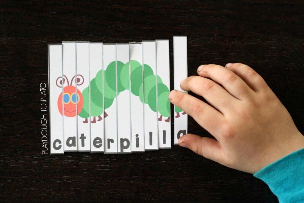 A word puzzle for students made from a drawing of a caterpillar cut into vertical strips. Each strip has a different letter of the word 'caterpillar' printed on it.