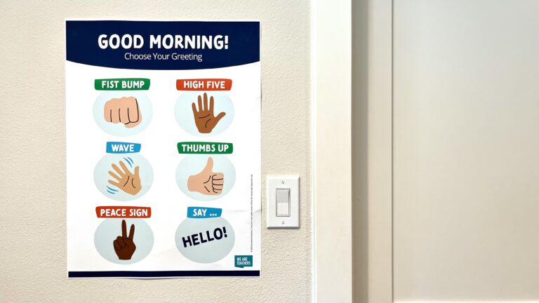 Image of classroom greeting sign on blank wall
