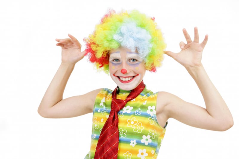 child dressed as clown