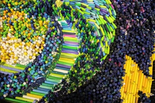 Collaborative art projects can use everyday objects like this colorful mosaic made of broken crayons. 