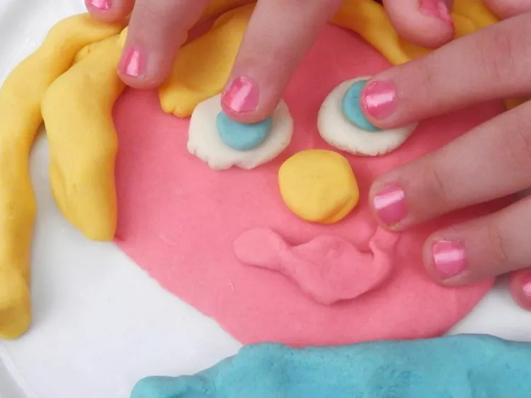 DIY-play-dough Colorful play dough in the shape of a face