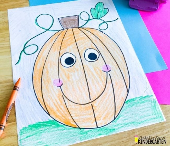 Directed Drawing for Kids include this crayon sketch of a pumpkin with. a smiley face