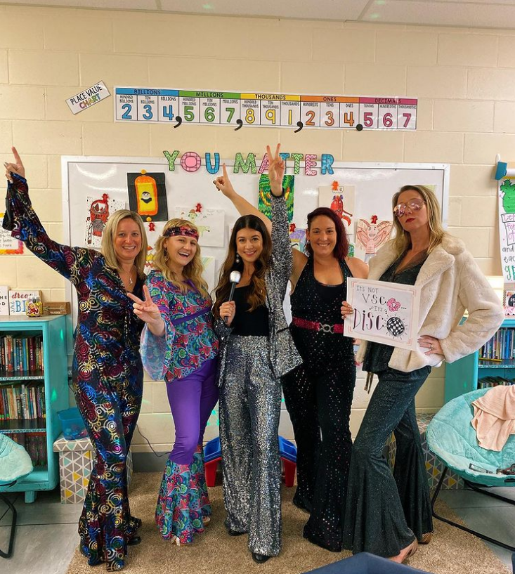 teacher halloween costumes shows teachers dressed up in 70's disco glam.