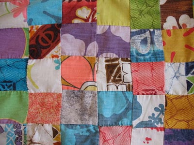 A patchwork quilt is shown (earth day crafts)