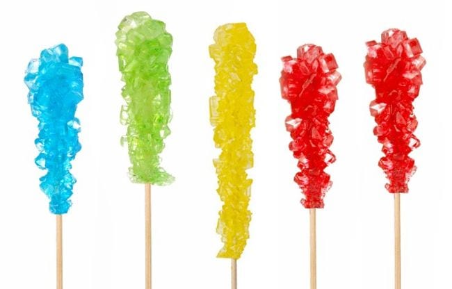 Colorful rock candy on wooden sticks