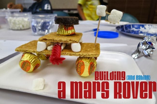 Mars rover made of graham crackers, peanut butter cips, and other items. Text reads Building (and Eating) a Mars Rover (Edible Science)