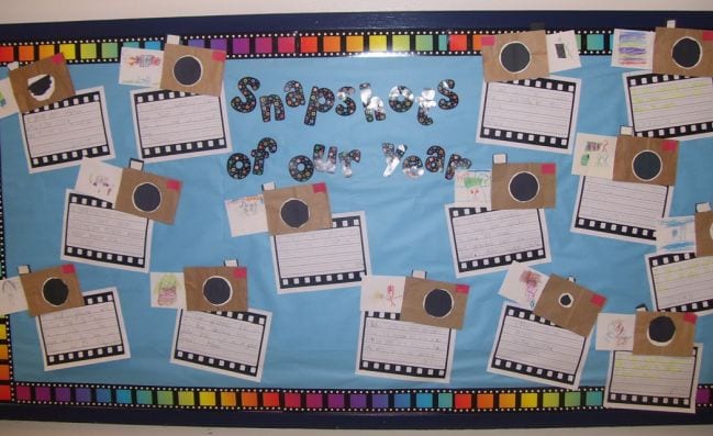 Bulletin board of Snapshots of Our Year with student writing assignments (End of the Year Assignments)