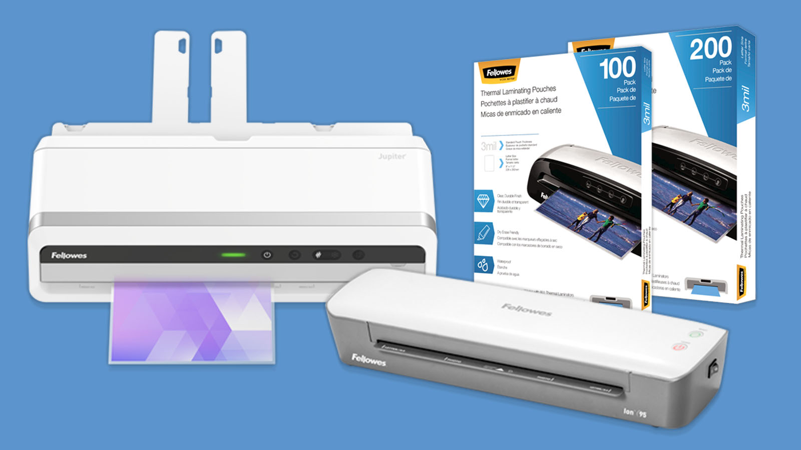 Two laminators and two packages of laminator sheets.