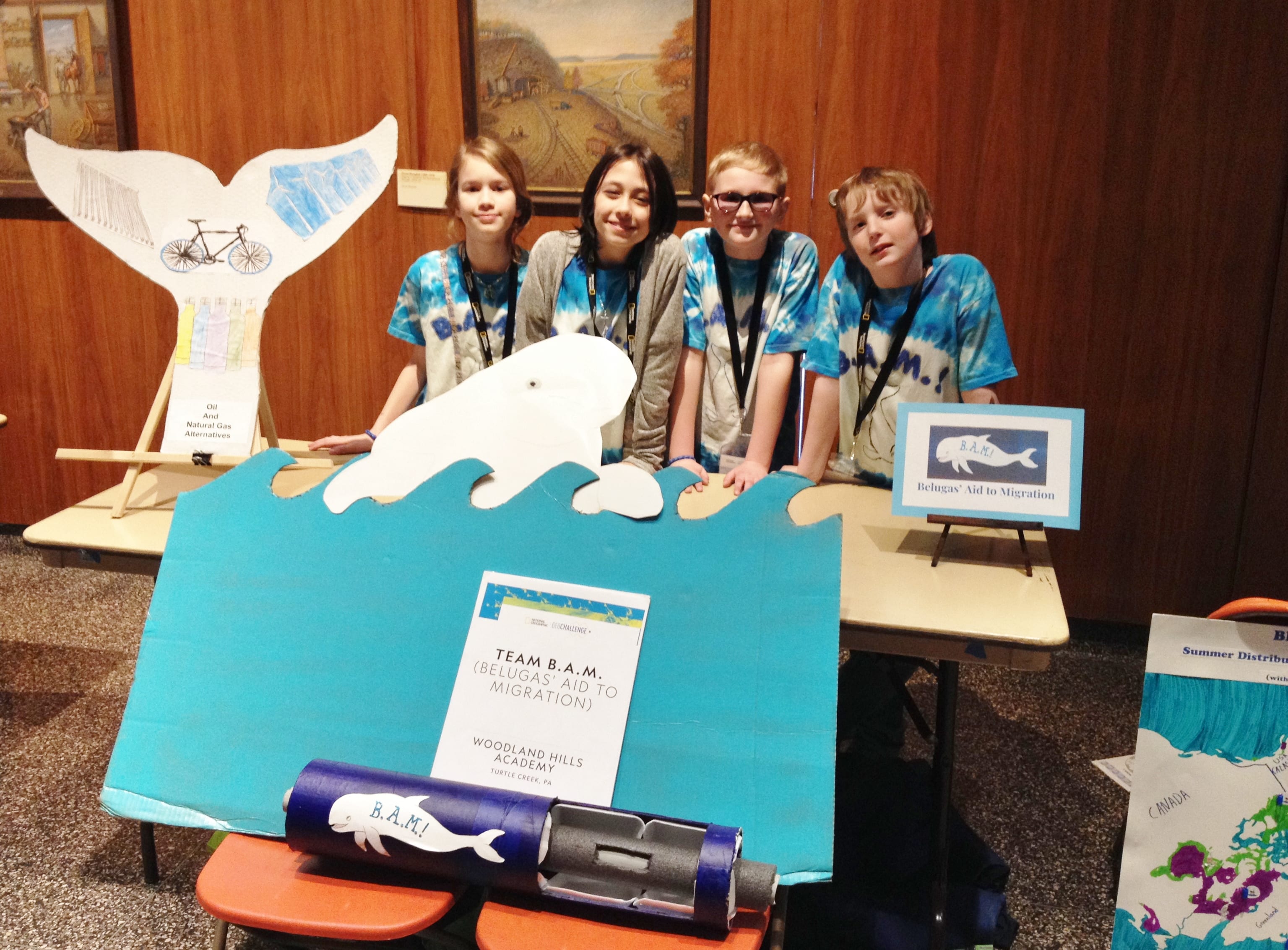 Woodland Hills Academy students showing their beluga whale GeoChallenge project - STEAM Skills