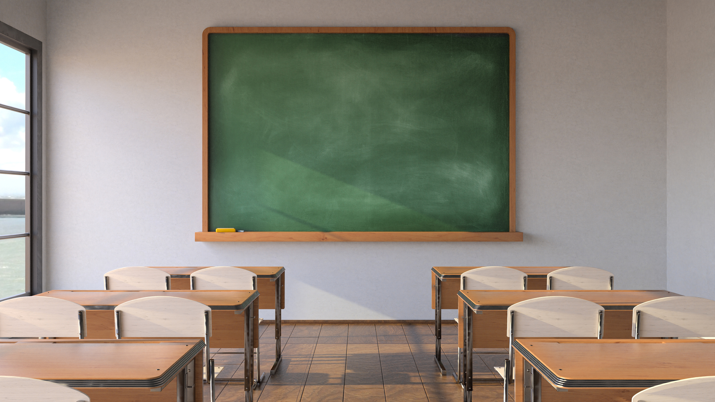 Classroom with an empty chalkboard