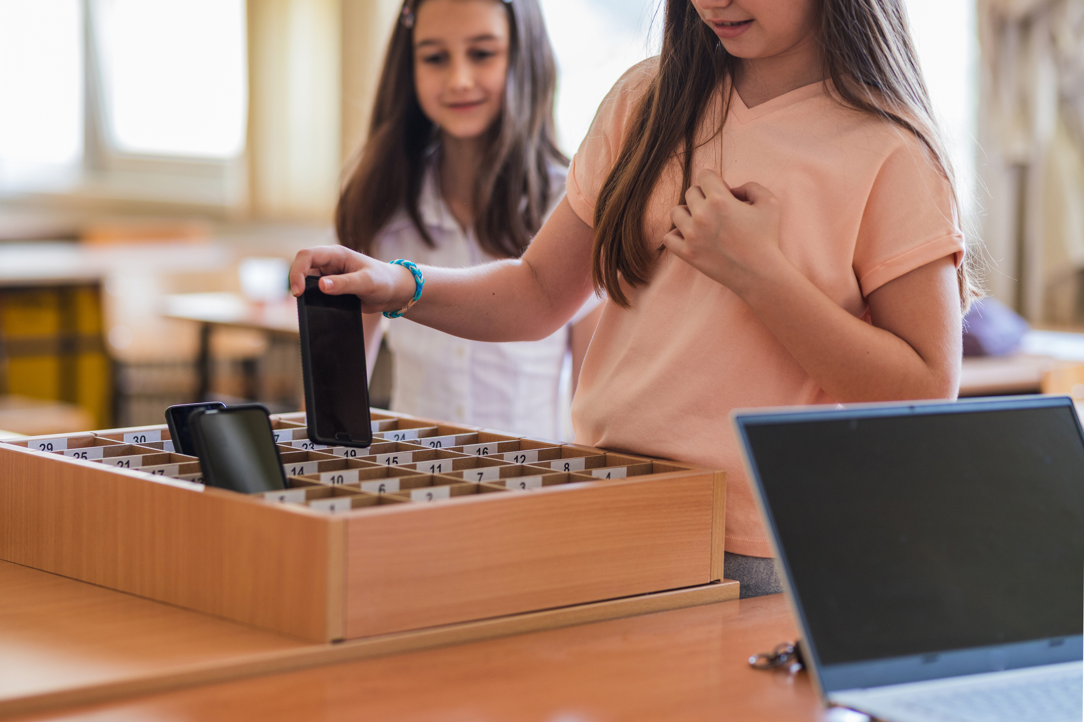 School making sure school kids are not using phones during class