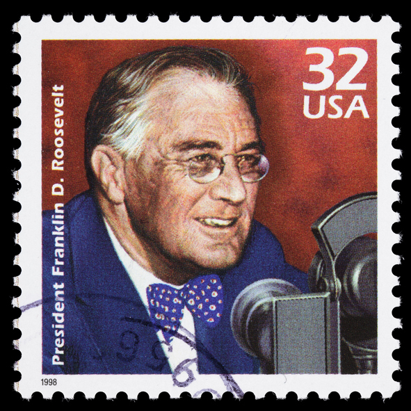 65 Great Leaders of the World Everyone Should Know Sacramento, California, USA - March 20, 2011: A 1998 USA postage stamp with an illustration of Franklin Delano Roosevelt (1882-1945) speaking into radio microphones. Often referred to as FDR, his series of radio addresses during the Great Depression became known as "fireside chats". Stamp design by Paul Calle.
