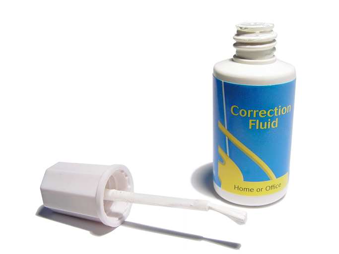 Famous inventors white-out correction liquid bottle on white background