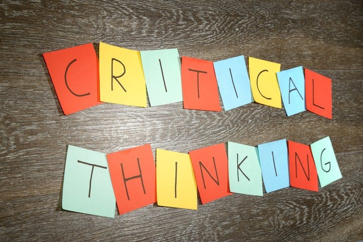 "Critical thinking" written on sticky notes